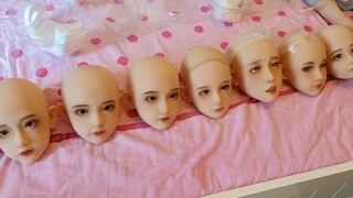 Come pack 10 doll heads