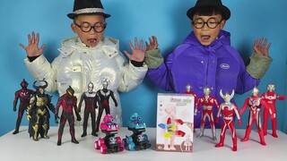 Ultraman dan Bellia membawa Ozawa dan saudaranya dua mobil mainan meriam dan merakit mainan boneka