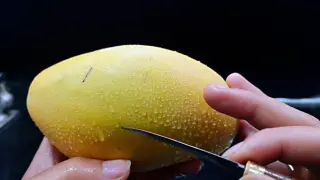 [DIY] Half A Mango Carved Into The Head Of A Phoenix