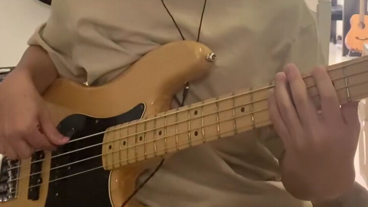 "Hotel California" was covered by a boy with bass with musical notes