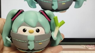 My daughter modeled the Penguin version of Hatsune Miku and made two of her favorite elements.