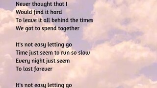 It's Not Easy Letting Go Lyrics