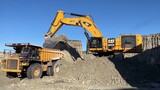 Caterpillar 6015B Excavator Loading Caterpillar 775&773 Dumpers - Sotiriadis Mi