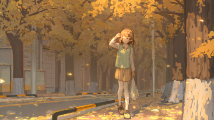 A girl walks on the street where ginkgo trees are falling