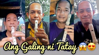 Tricycle Driver plays the Recorder while waiting for his Passengers