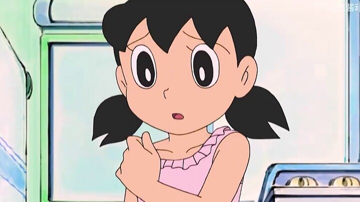 Doraemon: Nobita uses the enlarged balls to turn the bathtub into an ocean, and then calls Shizuka o