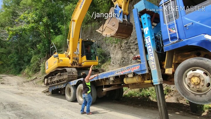 How to transport an excavator