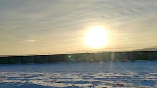 The sun shines at minus 20 in Russia. Russian winter road