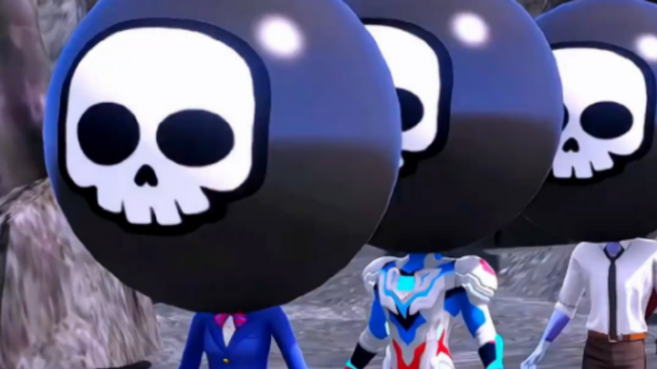 The monster captured Ultraman and tied dark bombs on their heads.