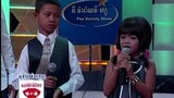 4 / A little Khmer boy and girl singing