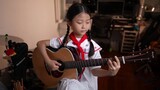  "The Internationale" by a girl playing the guitar 
