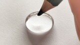 Writing in water droplets with a pencil is so crystal clear!