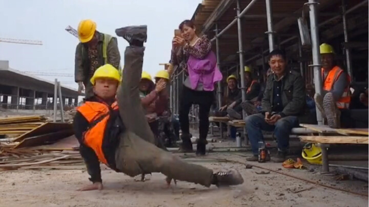 Take a break and do some self-taught floor dance (breaking)