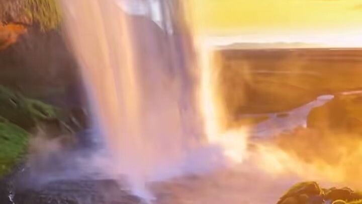 "When the beautiful waterfall meets the romantic sunset
