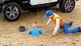Toy unboxing toy policeman playing with police car on beach and accidentally falling into sandpit