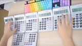 Memainkan Wan Gu Sheng Xiang dengan 8 kalkulator.