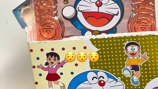 I opened two boxes of Doraemon cards. Have you watched the latest movies?