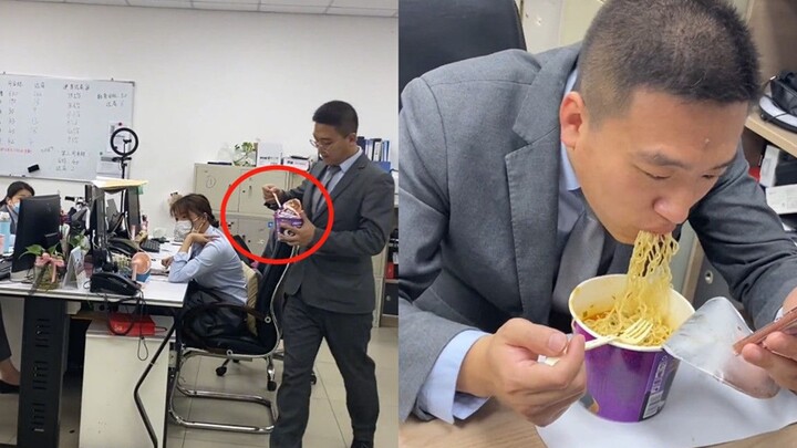 The young man was enjoying his pickled cabbage instant noodles when his colleague suddenly played a 