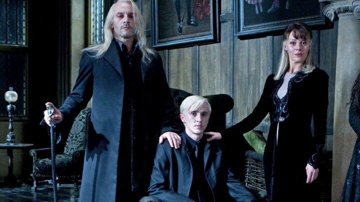 Malfoy is always by his family's side.