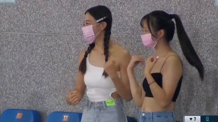 Beautiful spectators dancing under the Taiwan baseball field in summer