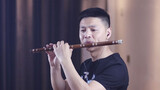 "Astronomia" was covered by a man with bamboo flute