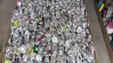 melting tin-cans aluminum into bars