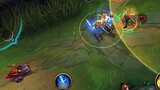 Olaf hangs Akali and squeezes him to death.