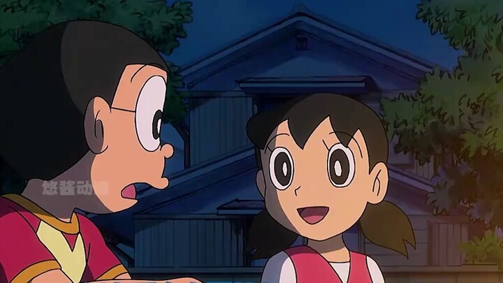 Doraemon: Nobita uses the night light to create a dark night during the day and holds a bonfire part