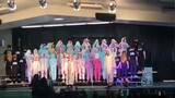 American elementary school students sing Sunshine Rainbow Little White Horse