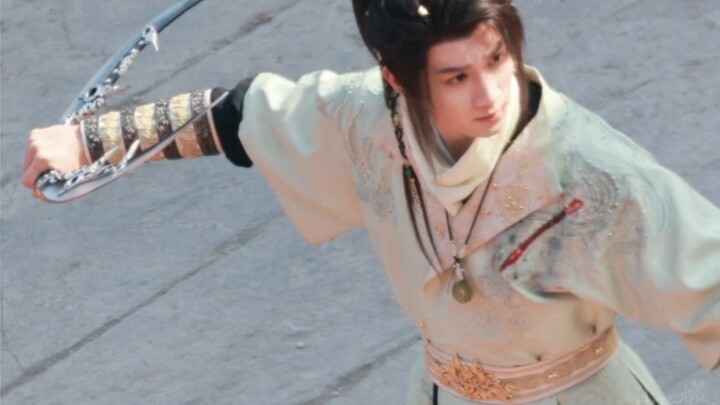 A real young man plays a young knight, and he is good at wielding a knife