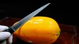 Carving on a papaya