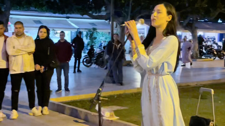 I am the first Moroccan to sing a Chinese song on the street. Everyone likes it very much. I must co