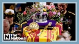 Card on top of Queen Elizabeth's coffin shows message from King Charles