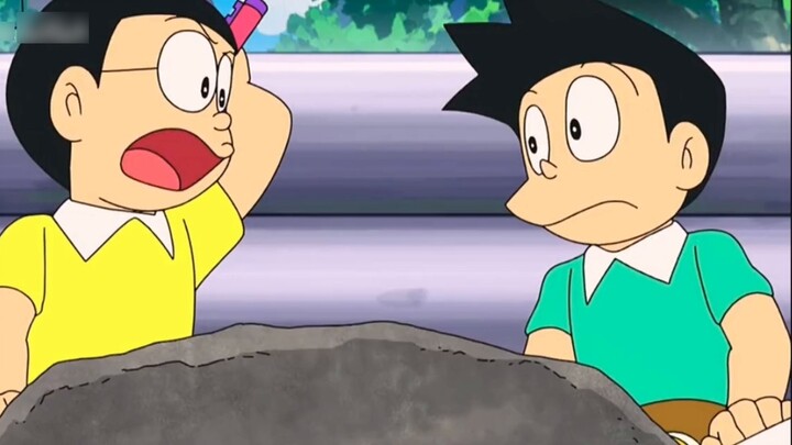 Doraemon Nobita mengubah dirinya dan suaminya menjadi batu