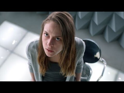 Locked Inside A Mysterious Room, An Unknown Voice Commands Her To Complete A Series Of Puzzles