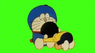 Nobita crying in Doraemon's arms