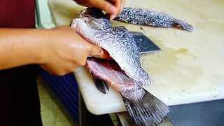 Fried snapper topped with sauce (Thai style) ,揚げシーバス , ปลากระพงทอดน้ำปลา