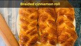 Braided cinnamon roll drizzled with caramel syrup